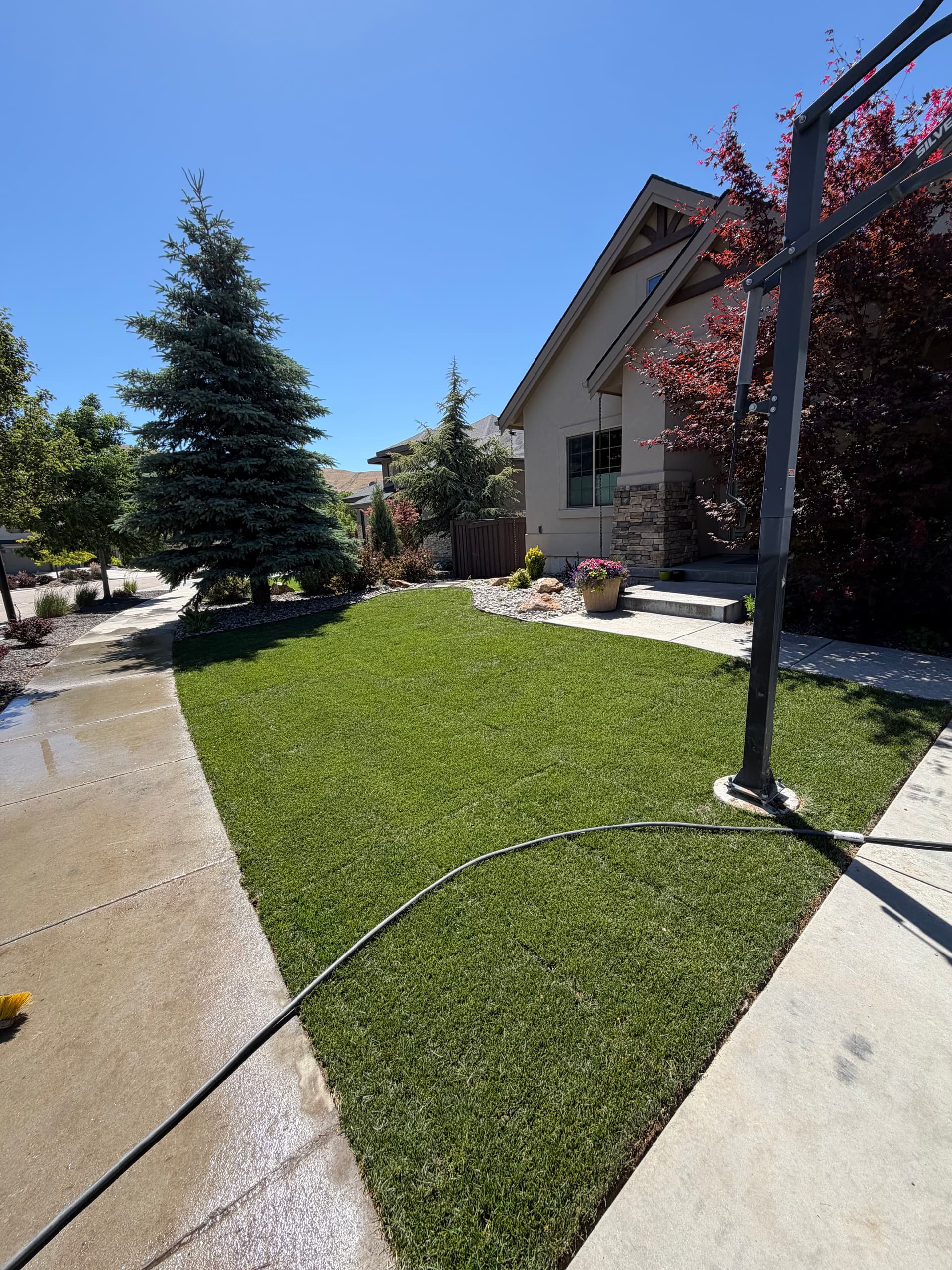 SE Boise Front Yard Gets Fresh Sod, Rock, and Boulders image