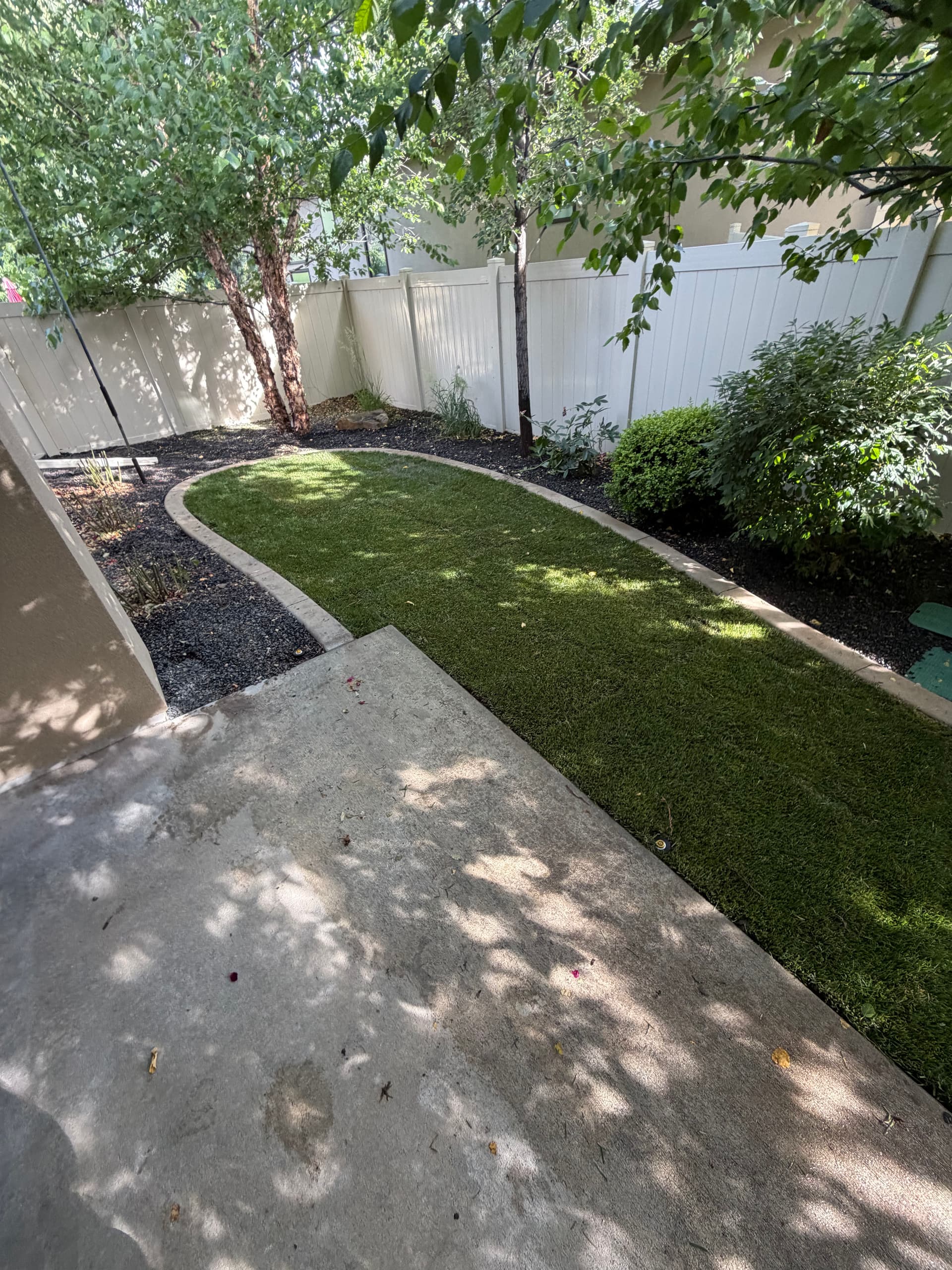 Old Artificial Turf Out, Natural Sod and Sprinklers In image
