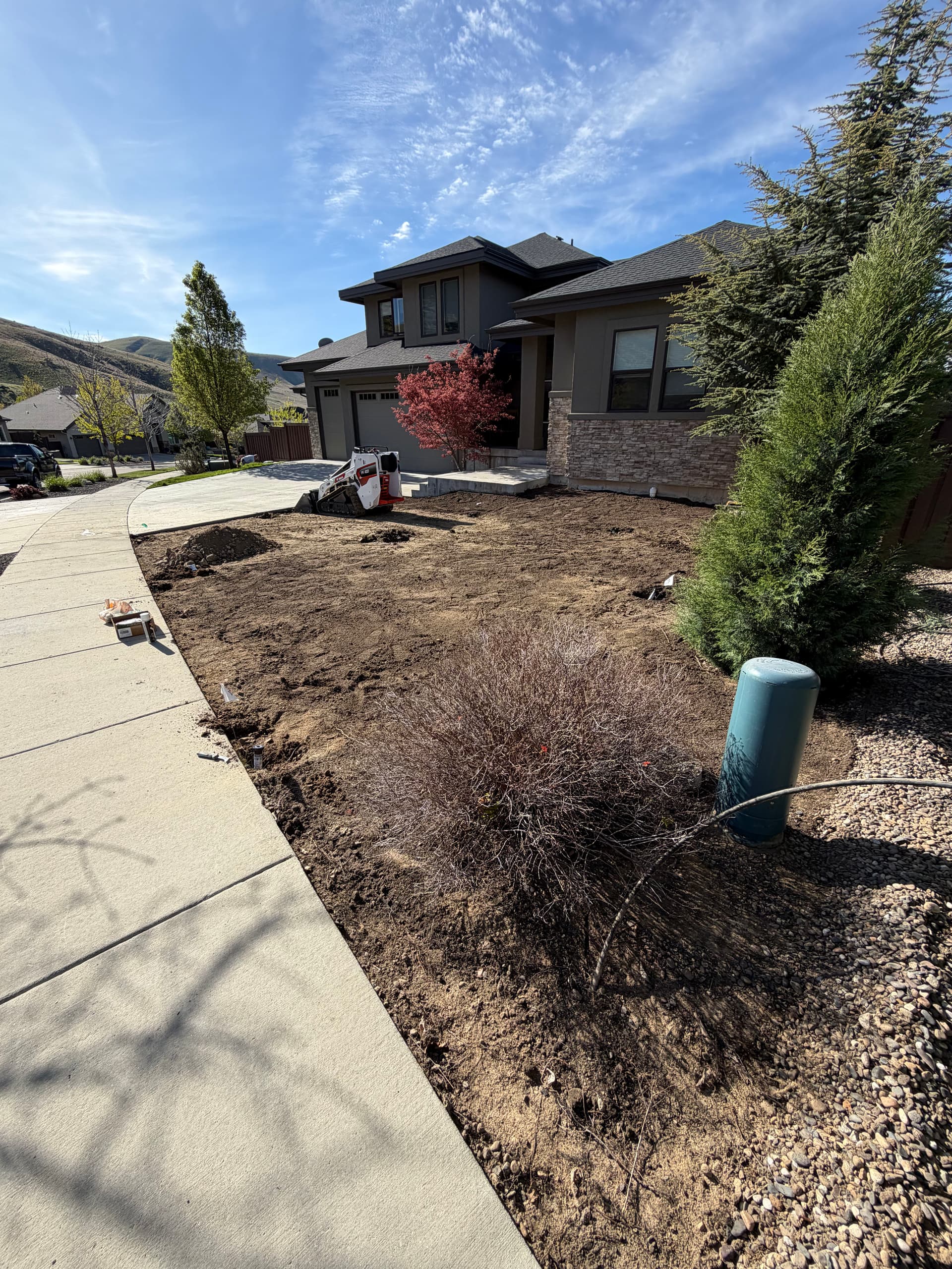 Gallery photos for SE Boise Front Yard Gets Sod, Boulders, and a Cleaner Layout: Image #1