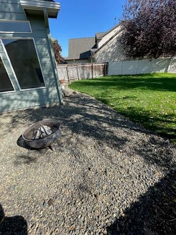 Gallery photos for Transformative Rock and Sod Makeover in Backyard: Image #1