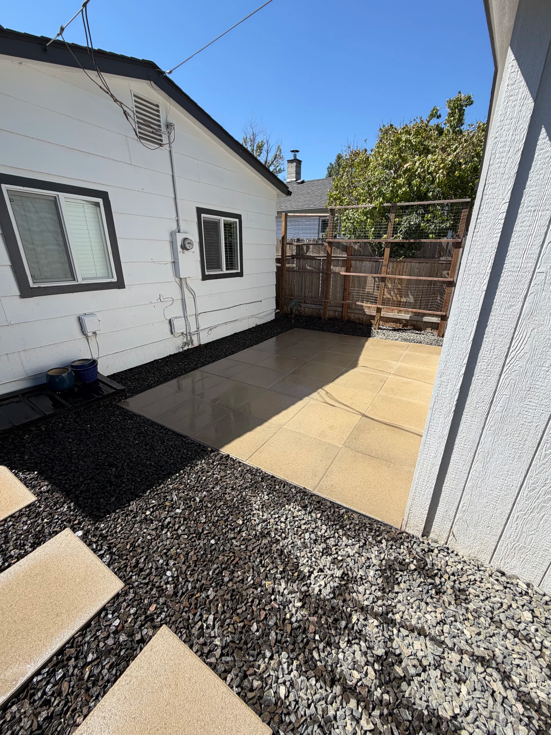 Gallery photos for Overgrown Backyard Turned Into a Clean Low-Maintenance Outdoor Space: Image #2